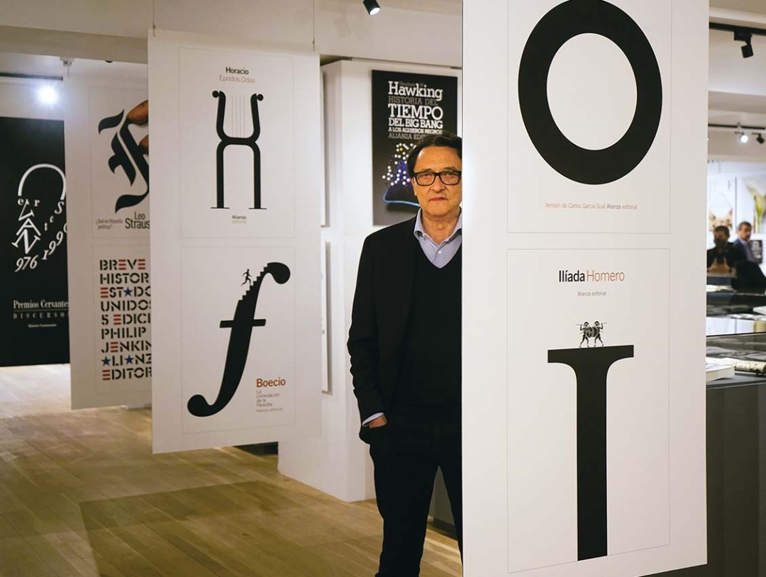 Designer Manuel Estrada poses at the exhibition covering 30 years of his career