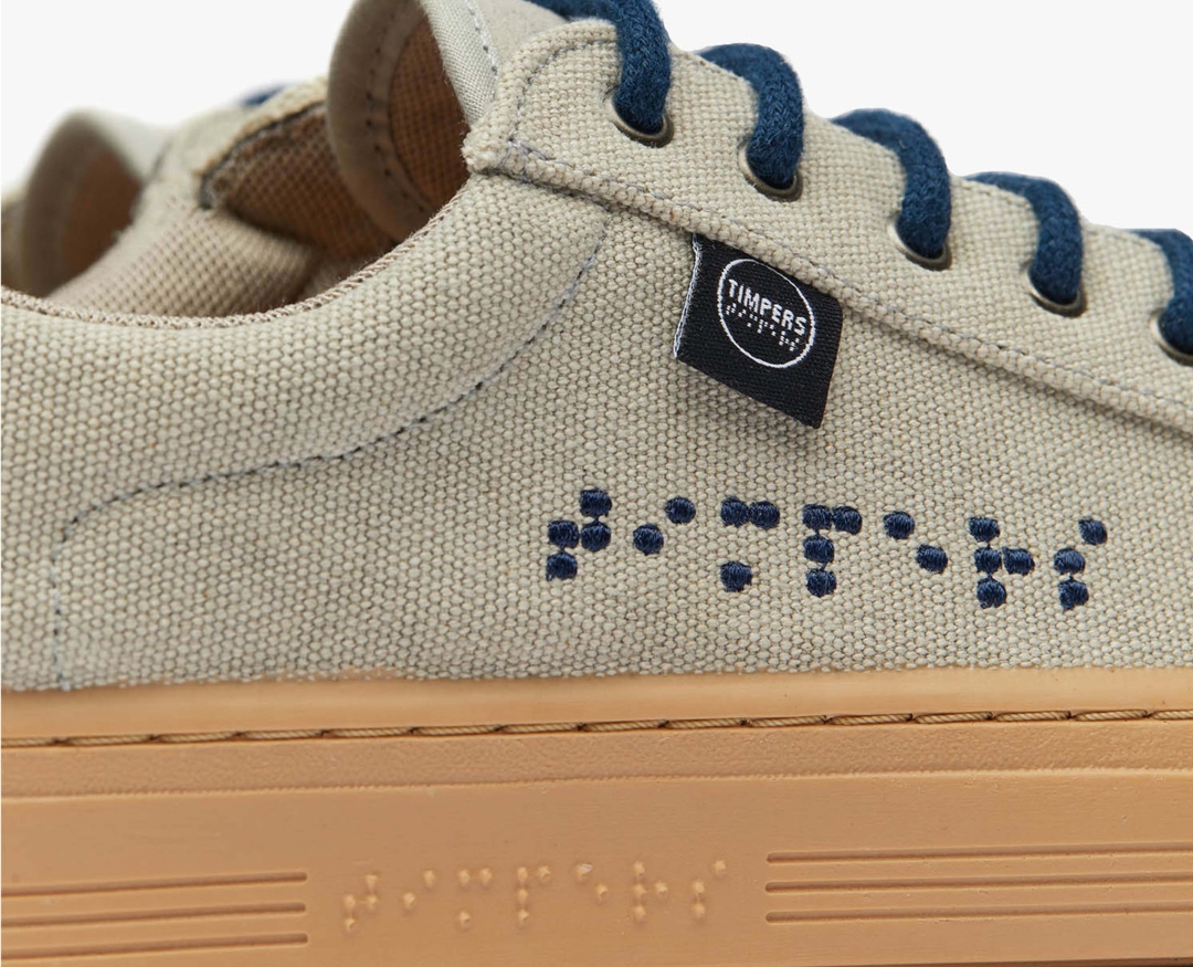 The word Timpers is embroidered in Braille on all their models